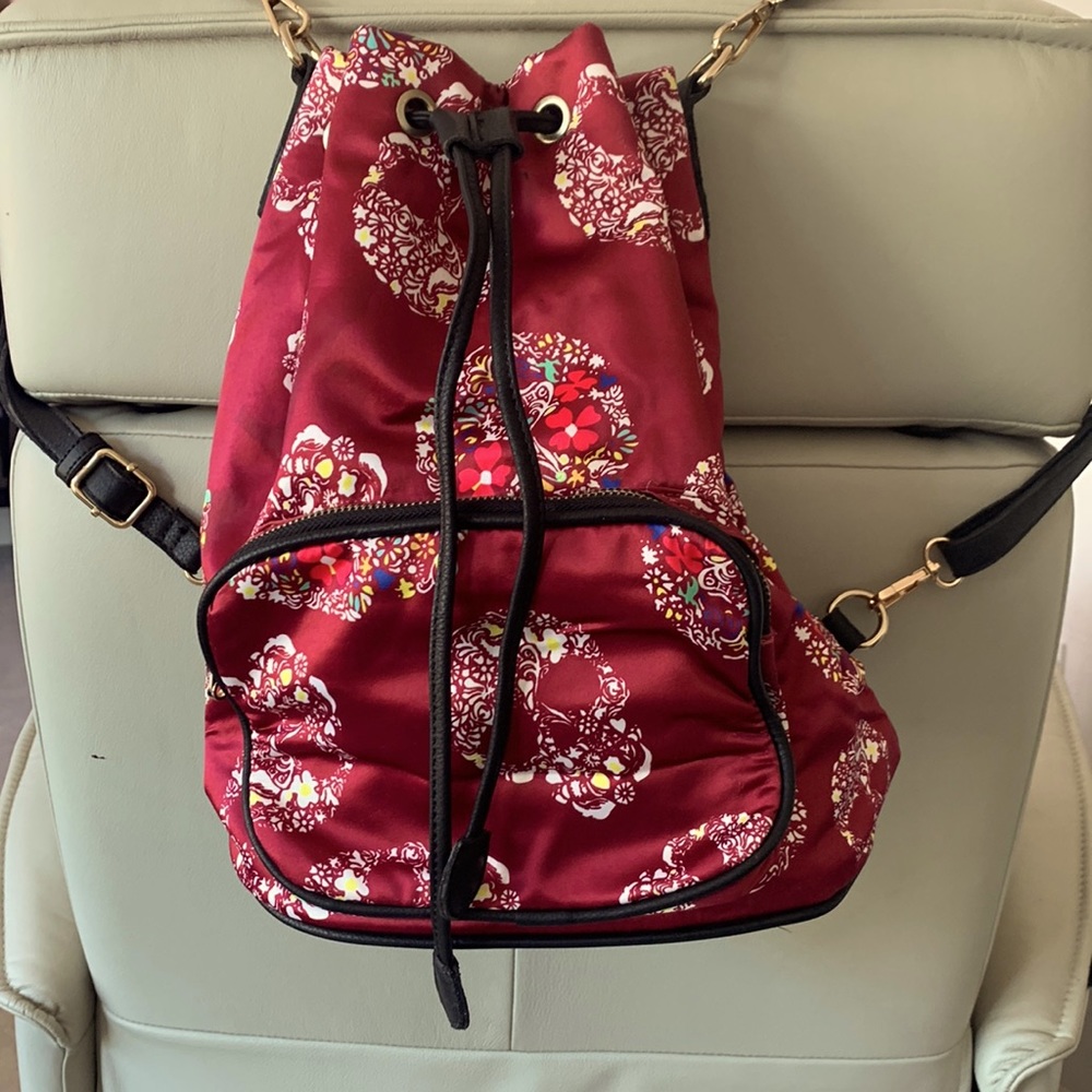 Skull cute backpack.  Silk and leather.